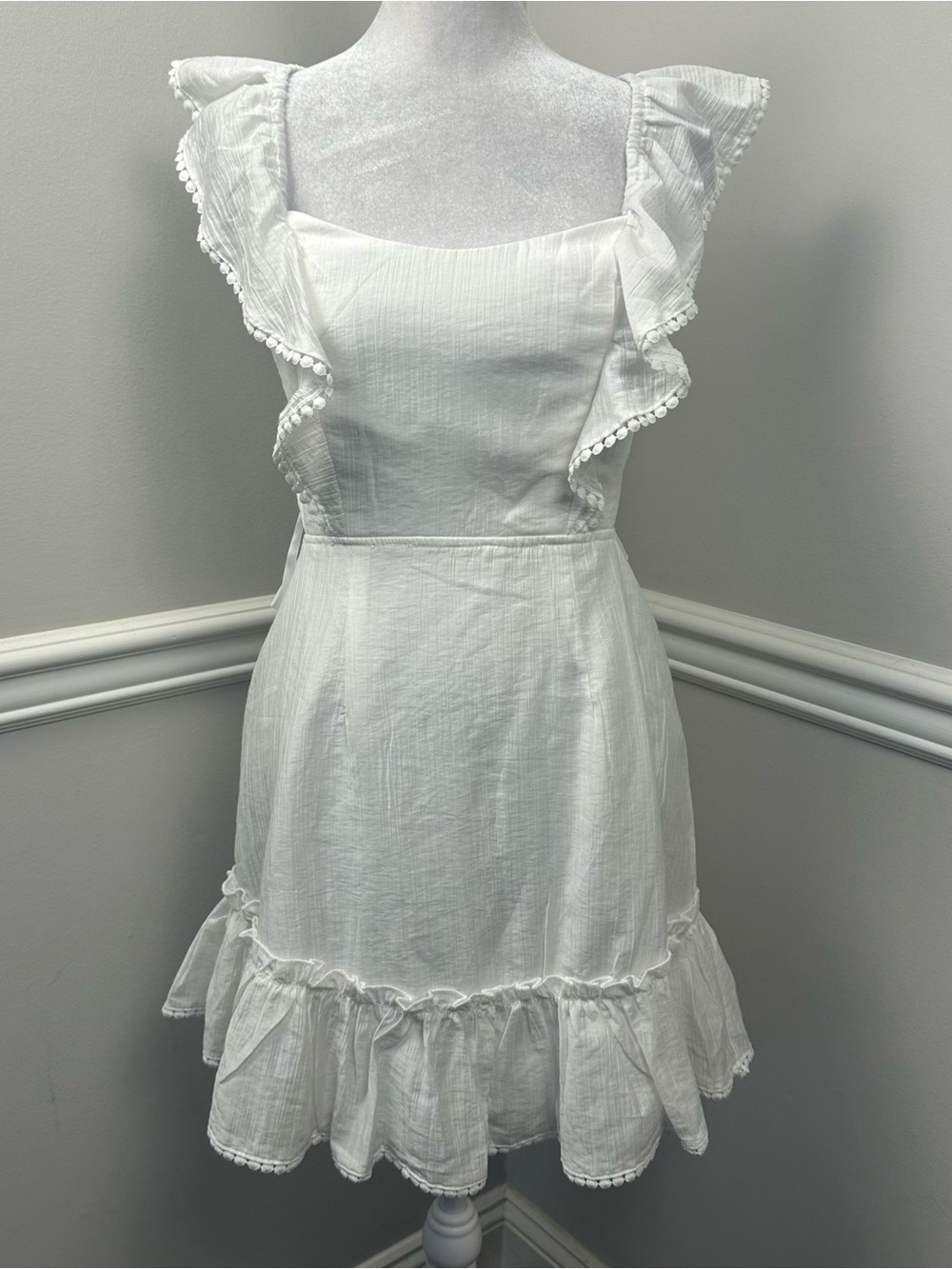 Saints & Secrets White Ruffled Mini Dress with Pom-Pom Trim M